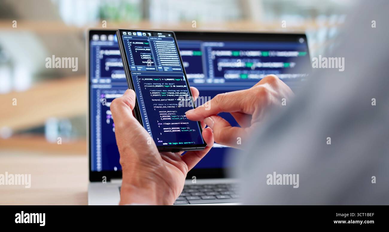 Woman Coder Working On Web Development At Office Desk Stock Photo