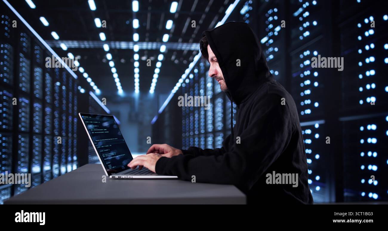 Old Man In Mask Hacking Cloud Server For Cyber Security Stock Photo