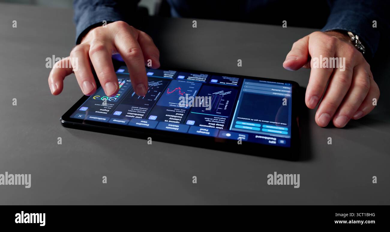 Businessman Analyzing Market Data With Analytic Dashboard On Computer Tablet Stock Photo