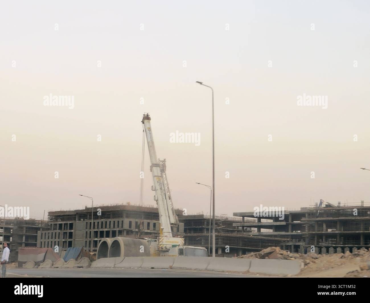 Cairo, Egypt, October 1 2025: A mobile crane at residence compound that ...