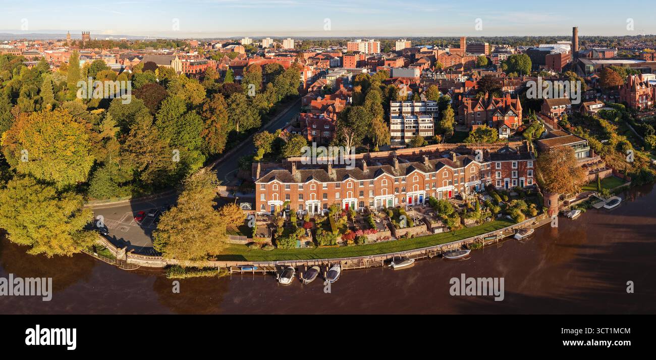 Wide panoramic aerial of Chester’s riverside with historic walls, red ...