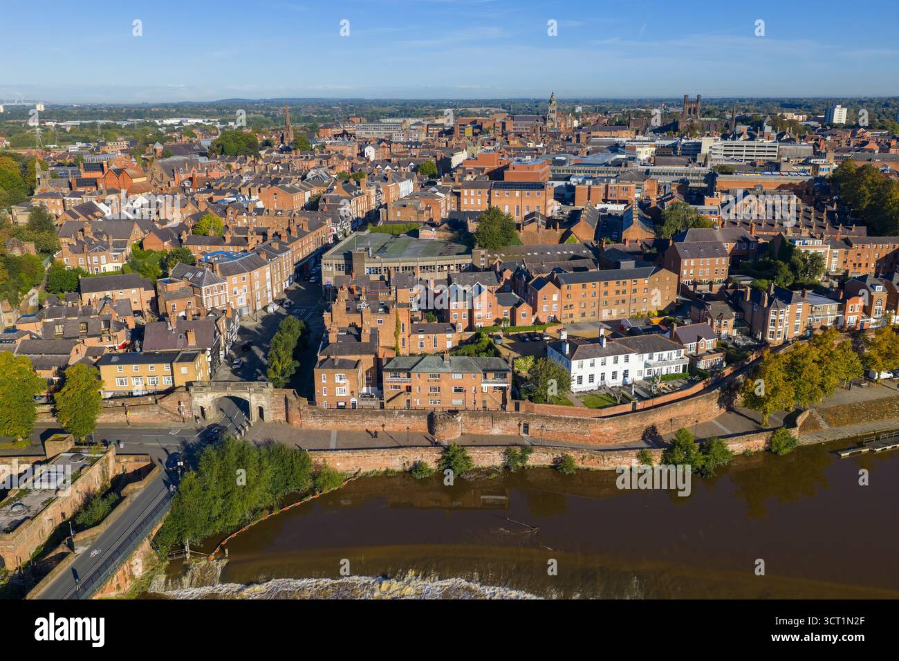 Aerial view of Chester’s city walls with cascading River Dee waters and ...