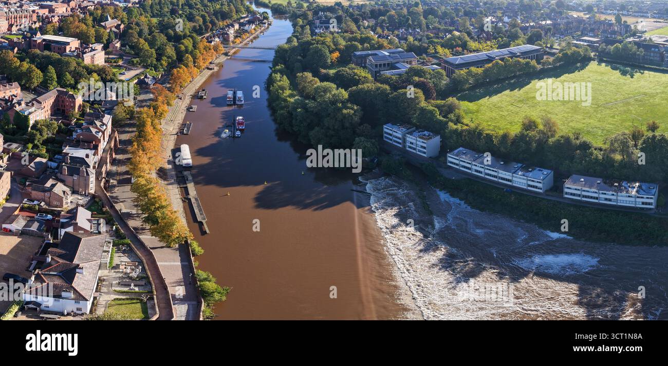 Panoramic aerial of Chester showing the River Dee waterfront, tree ...