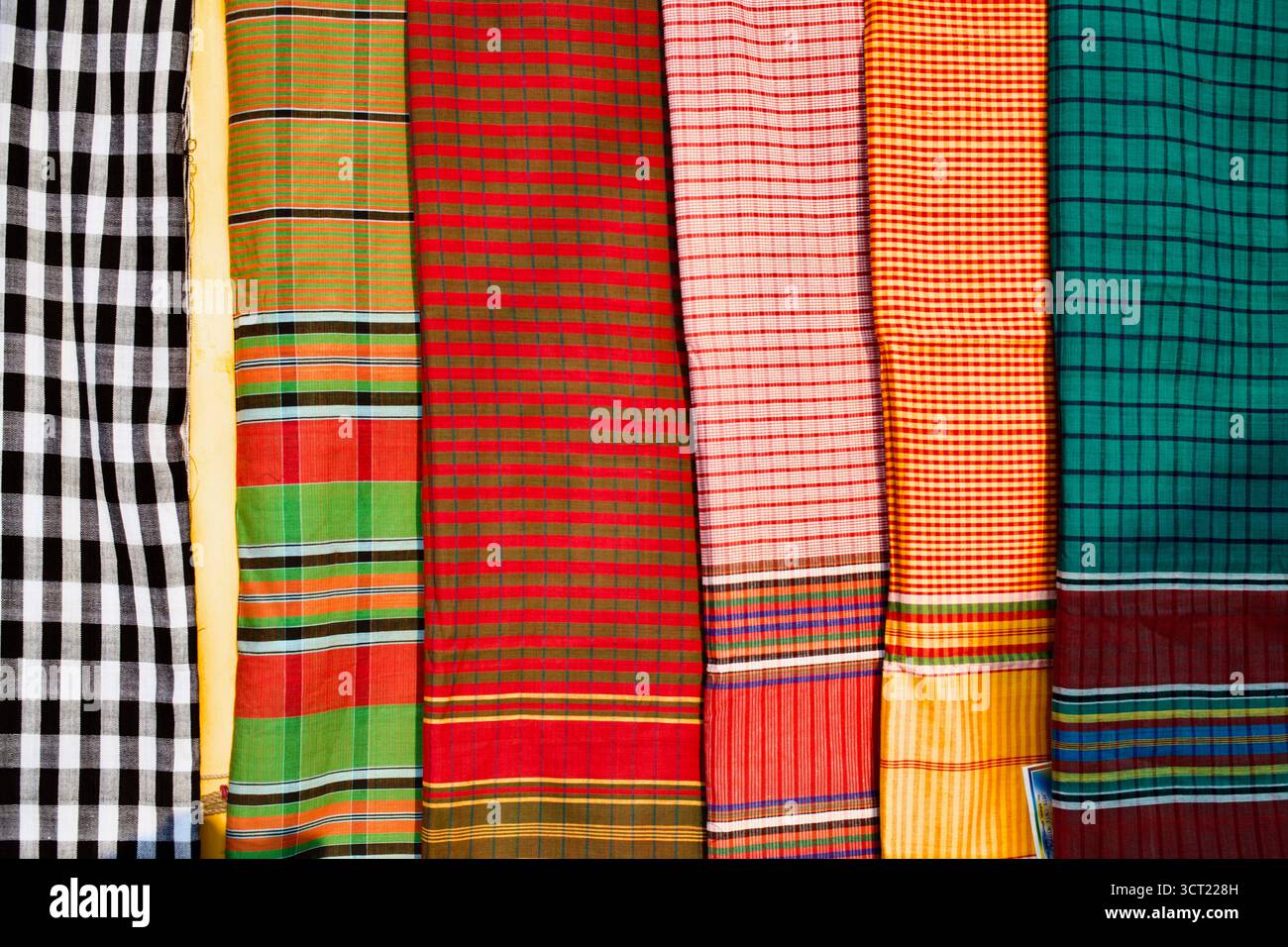 Traditional Bangladeshi gamcha towels in vivid plaid patterns on ...
