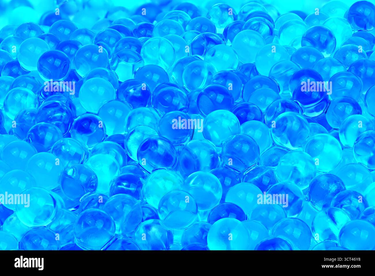 A blue background with many small blue spheres. The spheres are all ...