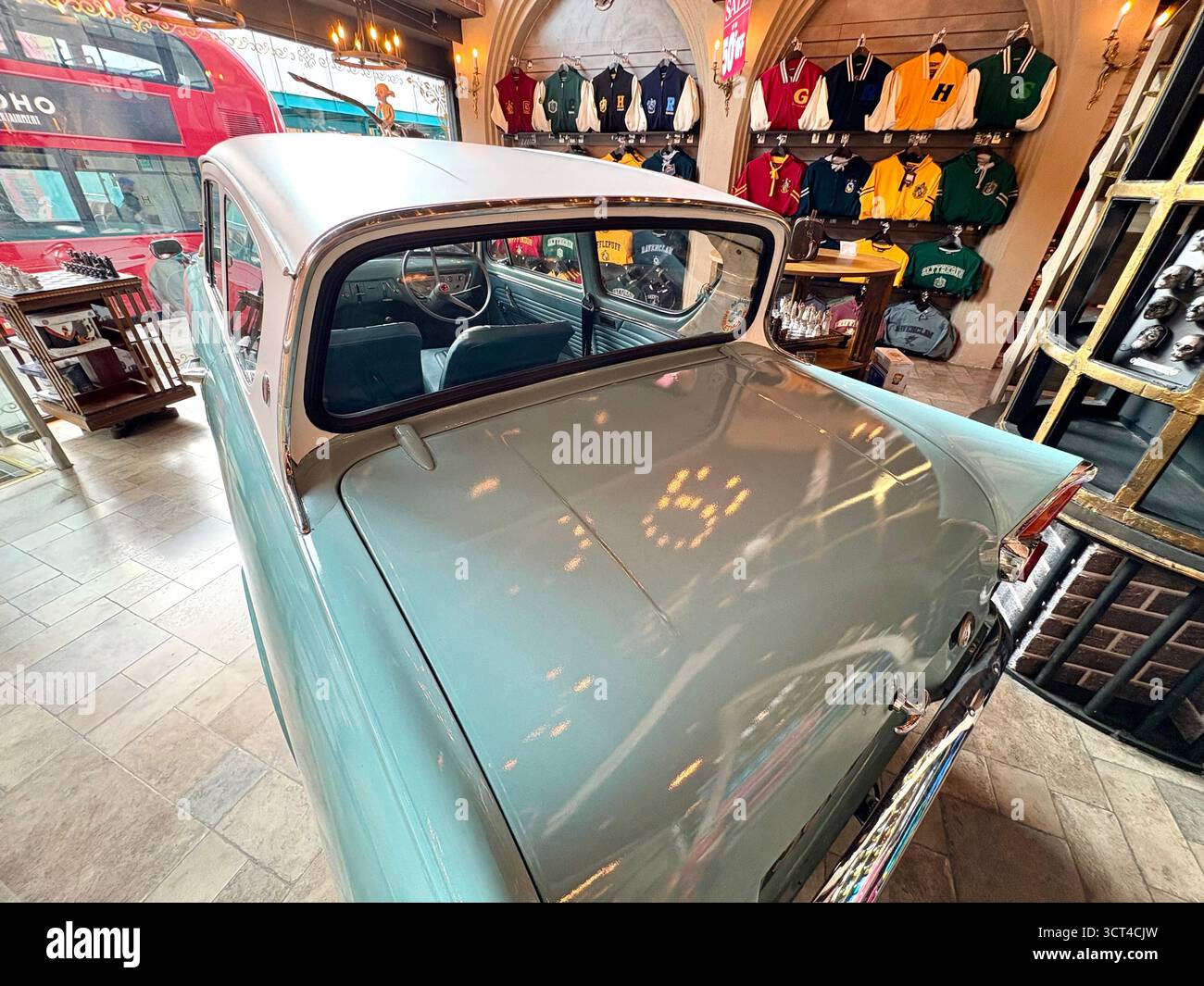 Harry Potter Ford Anglia car in Wizard s & Won ders gift shop on the Strand in London city centre,England,UK - Smartphone Captured Stock Image