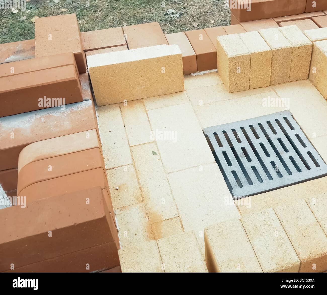a Construction of red brick, brick masonry. Stock Photo