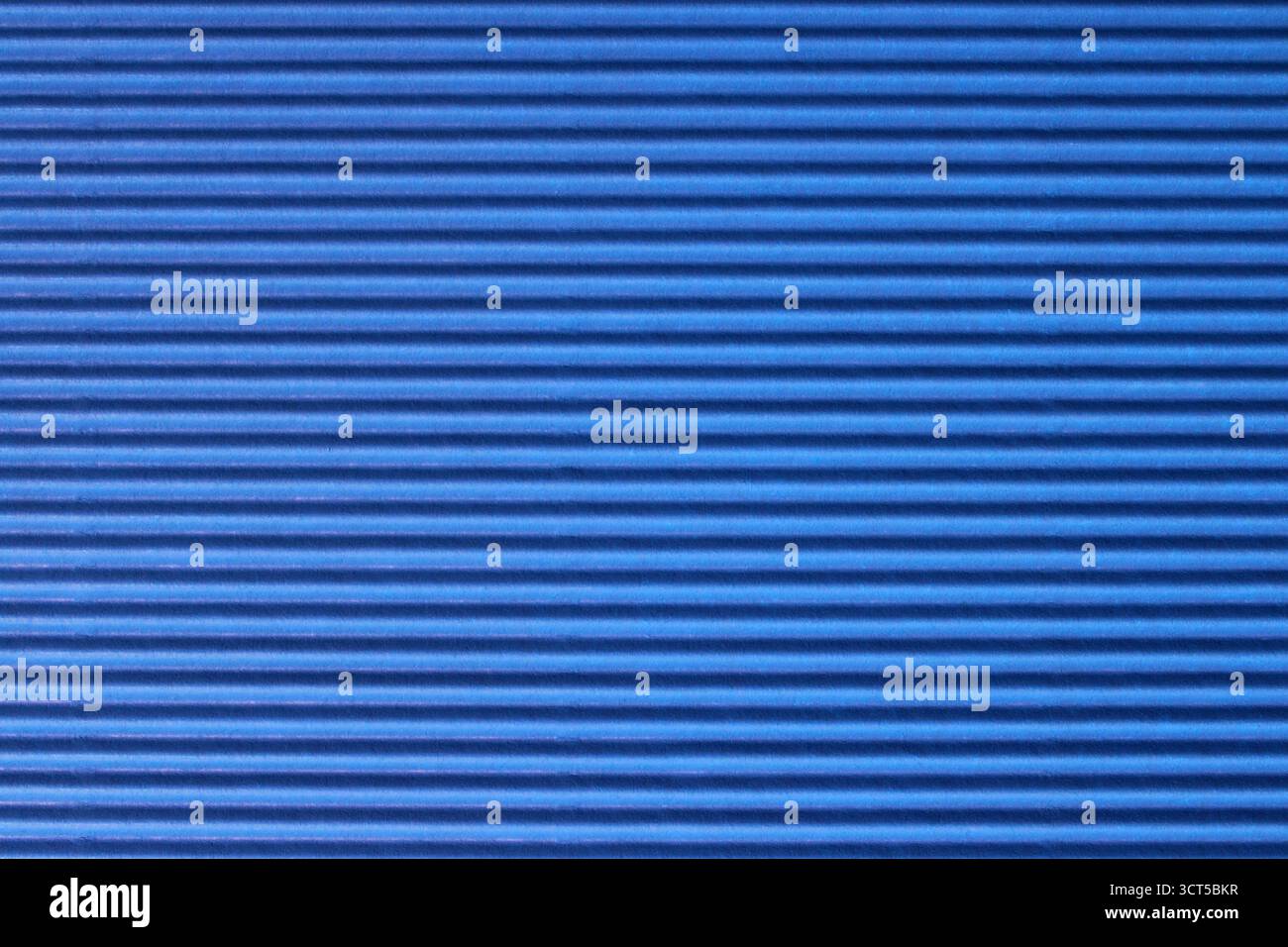 Background and texture, striped blue cardboard, horizontal lines Stock Photo