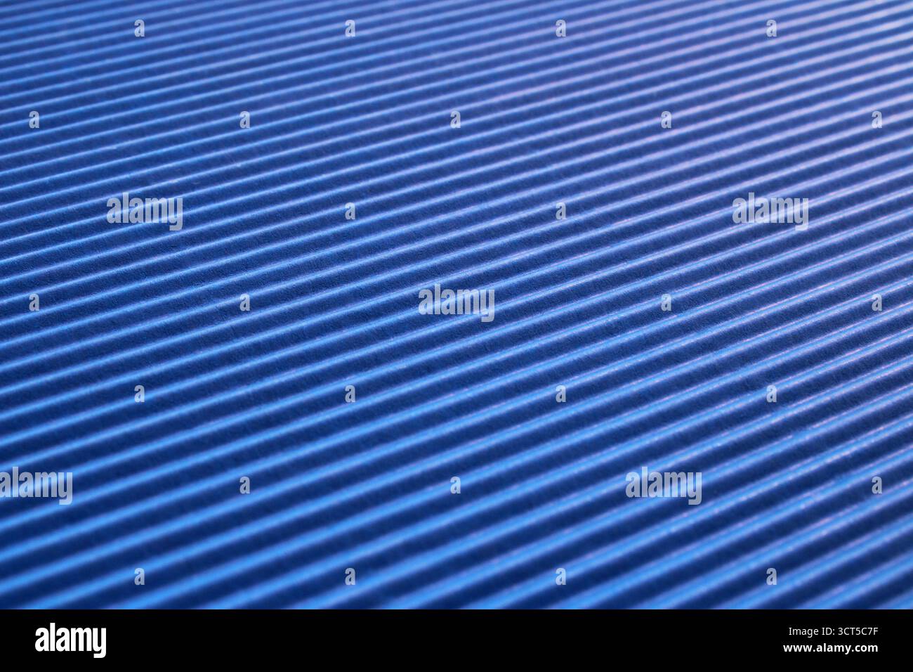 Background and texture, striped blue cardboard, diagonal lines Stock Photo