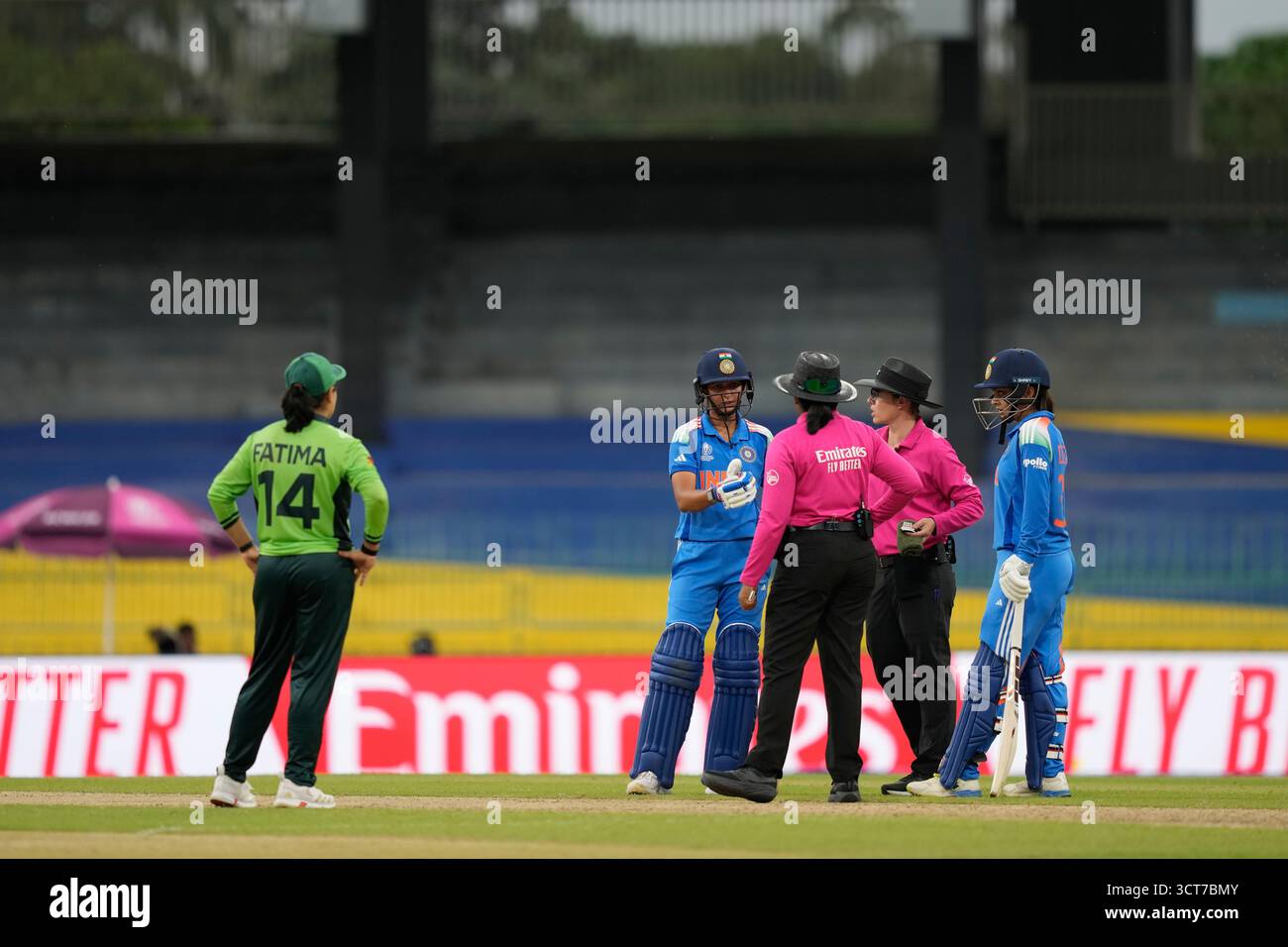 India's captain Harmanpreet Kaur gestures as she speaks with umpires ...