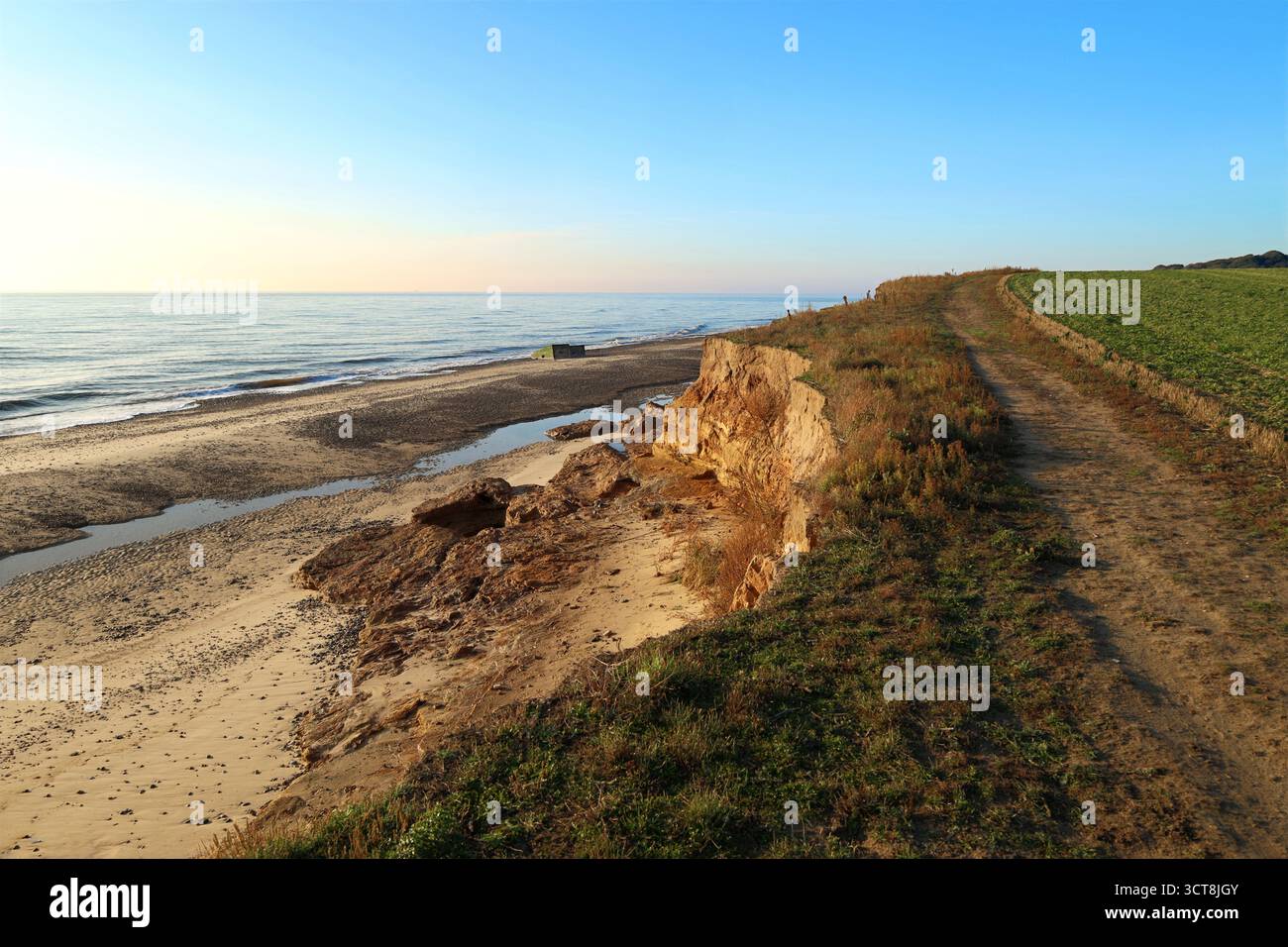 View from the cliff footpath at Benacre Beach, near Kessingland, Suffolk, England, UK. A concrete wartime pillbox in North Sea can be seen in distance Stock Photo