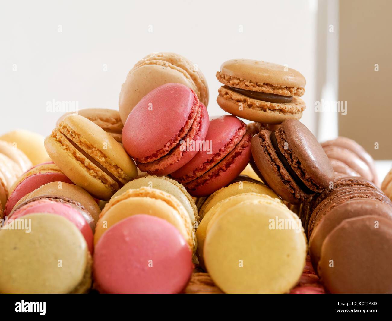 French macarons in pastel colors displayed at wedding reception. Stock Photo