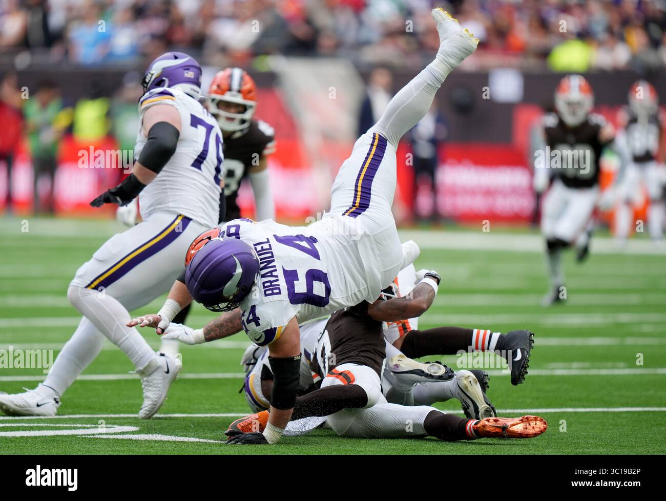 Minnesota Vikings' Blake Brandel is tackled by Cleveland Browns' Greg ...