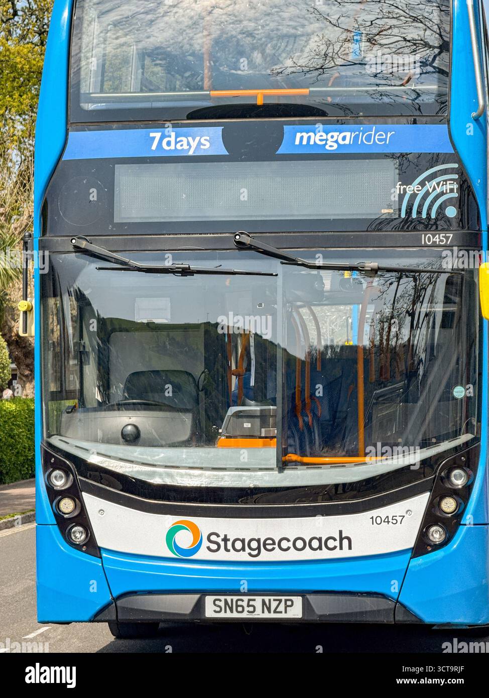Dartmouth, Devon, England, UK - 24 April 2025: Front view of a double decker bus operated by Stagecoach at a bus stop in Dartmouth town - Smartphone Captured Stock Image