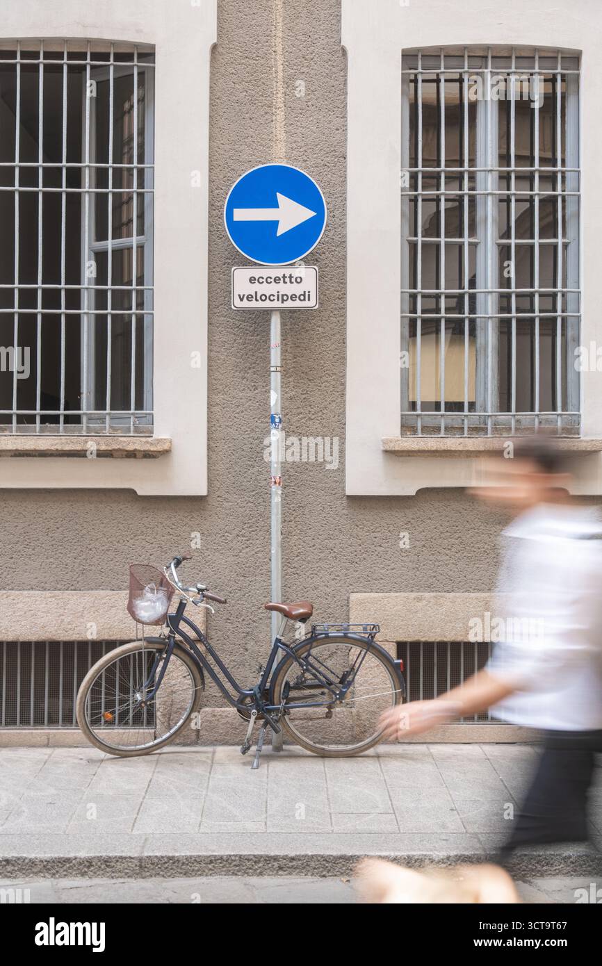 Vintage city bike by the wall, symbol of slow living and green commuting. Ideal for advertising urban cycling, healthy lifestyle, European streets Stock Photo
