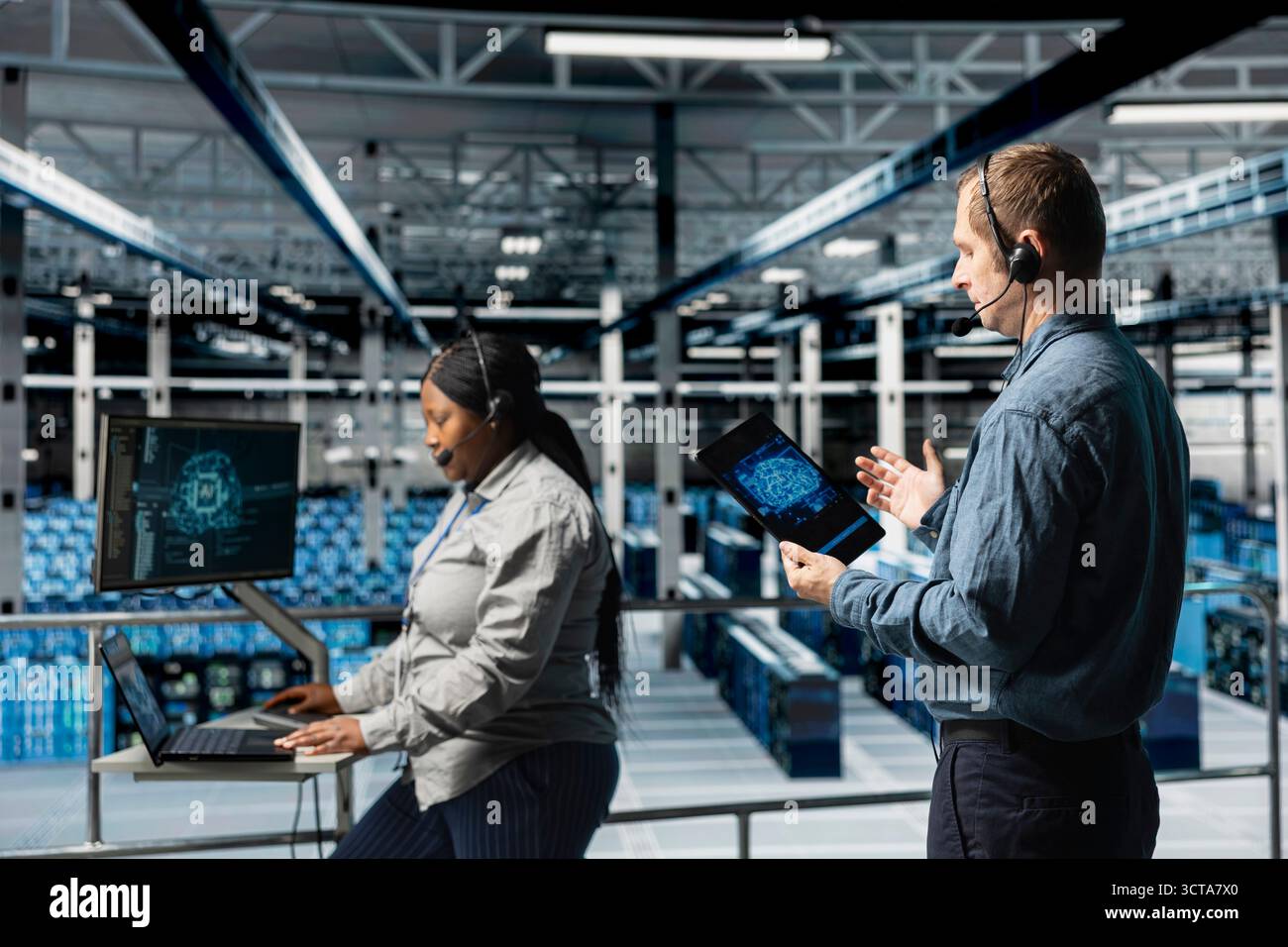 Server hub engineers providing remote tech support using headset and artificial intelligent tools. Teamworking employees coordinating IT maintenance tasks using AI technology Stock Photo