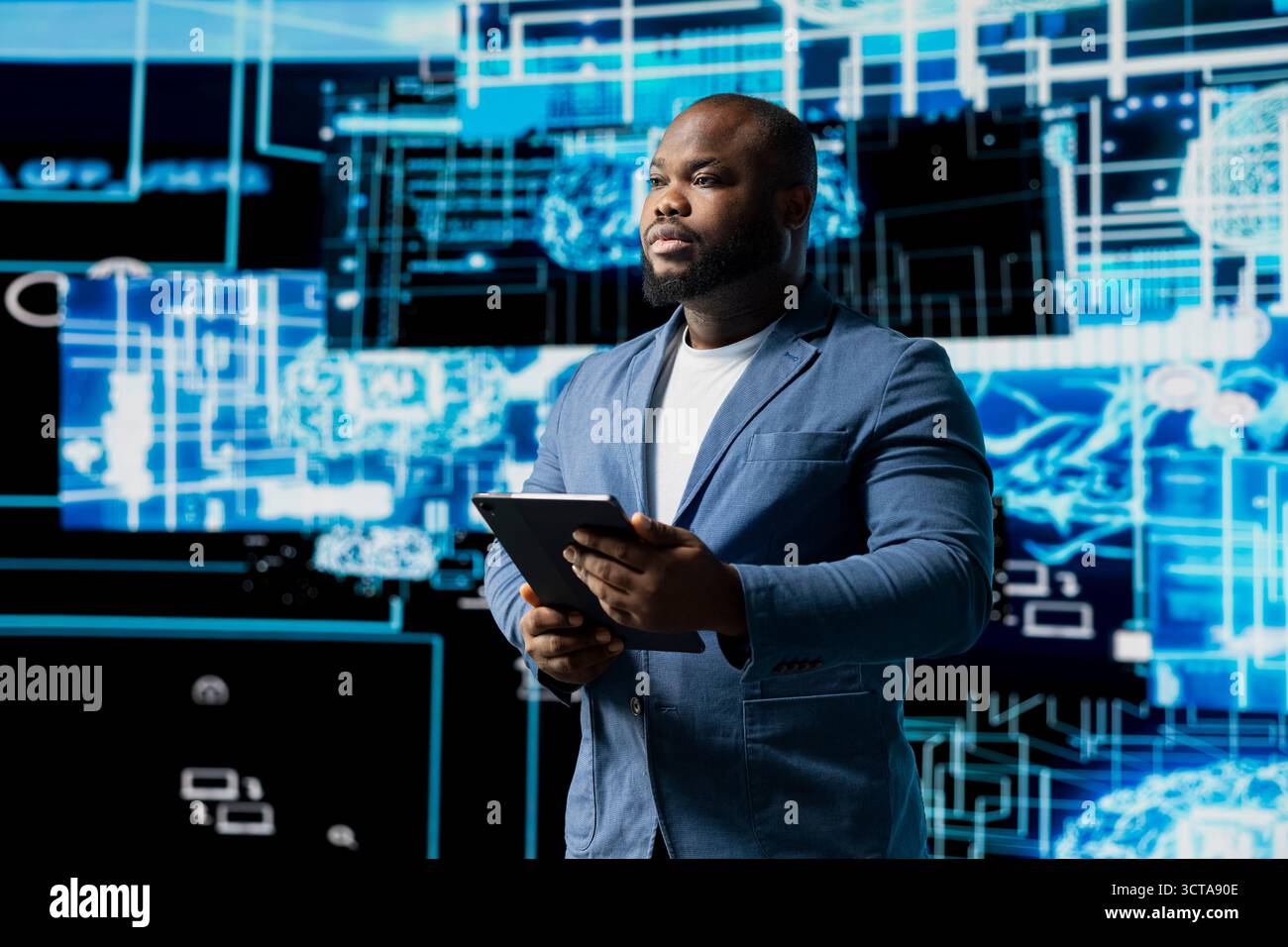 Young black technician reviewing AI data visualization and neural networks platforms, smart technology cyberspace systems. Studies machine learning, cloud computing and algorithms. Stock Photo
