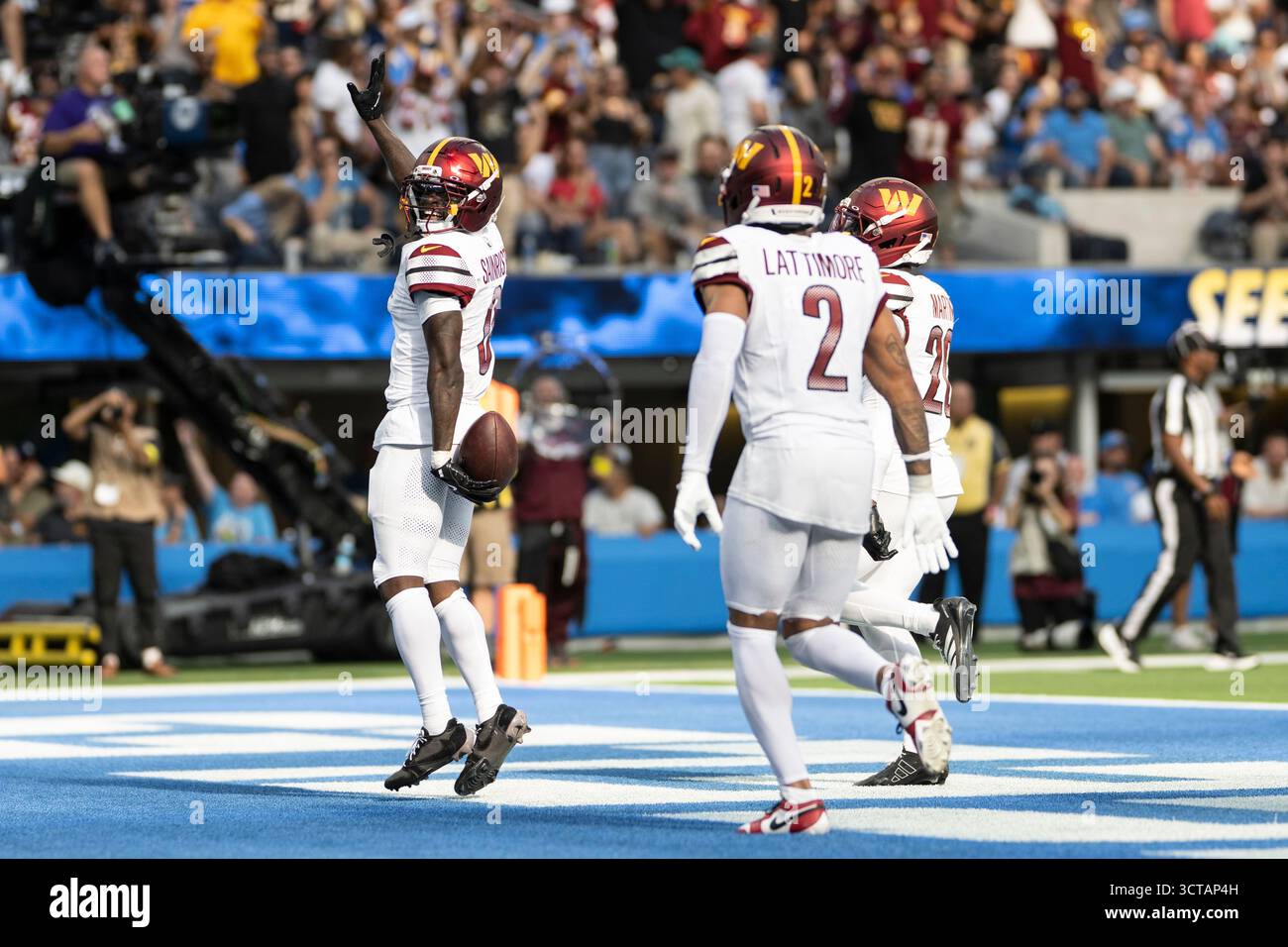 Washington Commanders cornerback Mike Sainristil (0) celebrates his ...