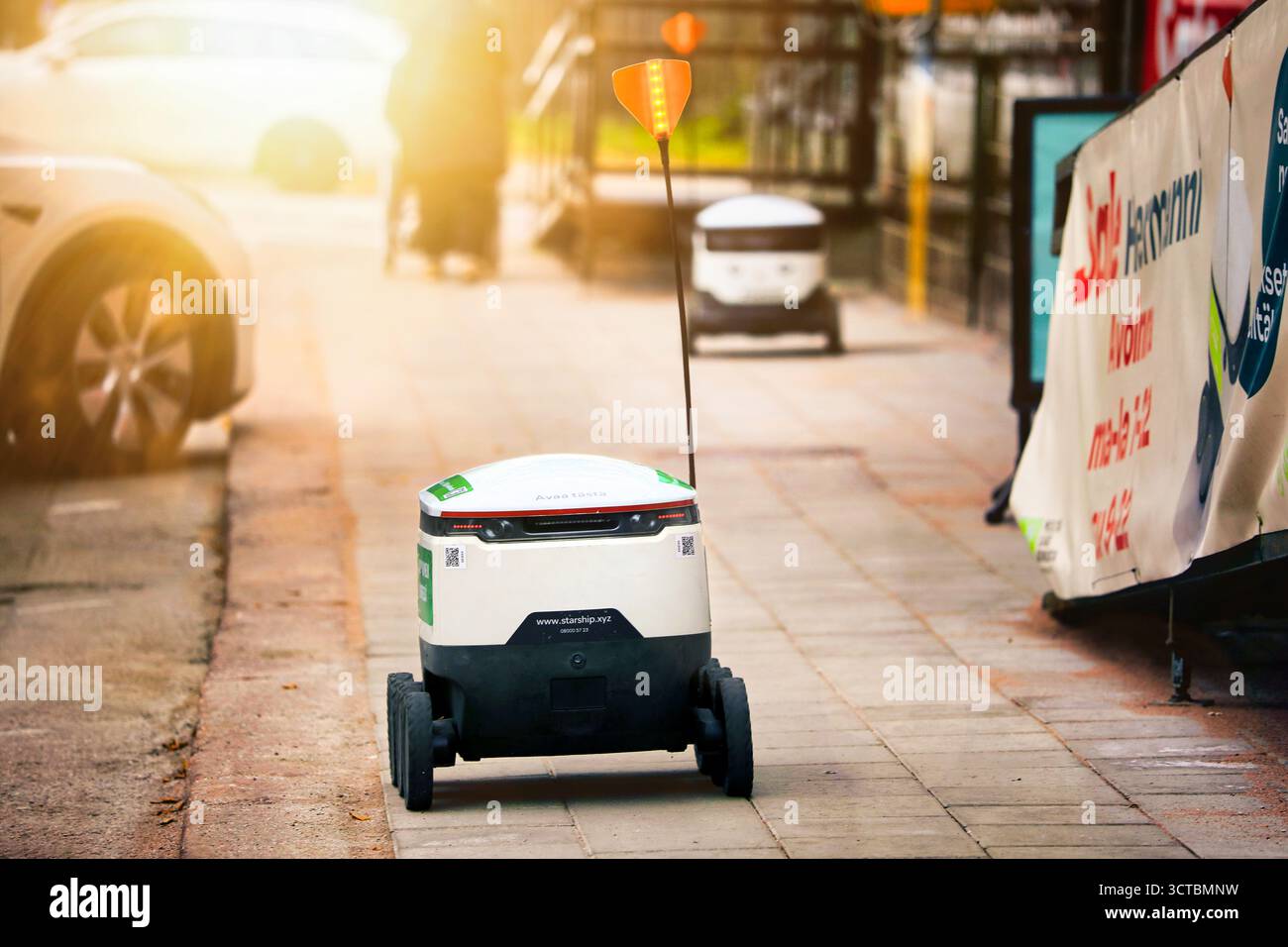 Starship Technologies self-driving food delivery robot near the Finnish S-Group store, 2nd robot on the background. Salo, Finland. Oct 3, 2025. Stock Photo