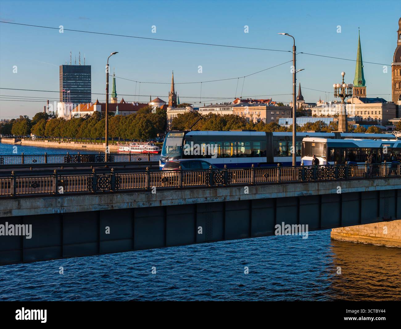 Aerial View of Riga with Bridge, Tram, and Historic Old Town Spires ...