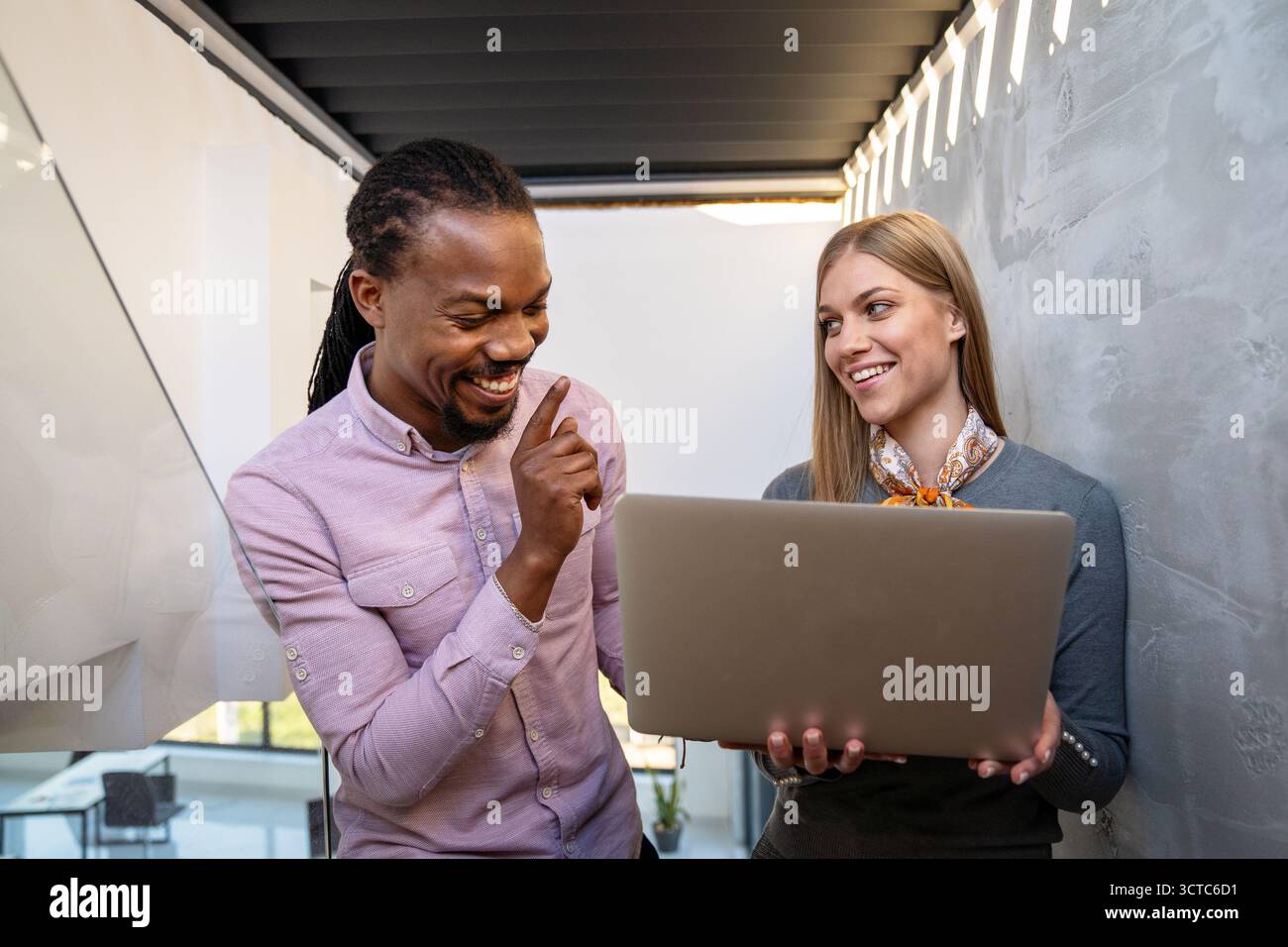 Happy software developers working on meeting, Programming advanced code artificial intelligence. Stock Photo