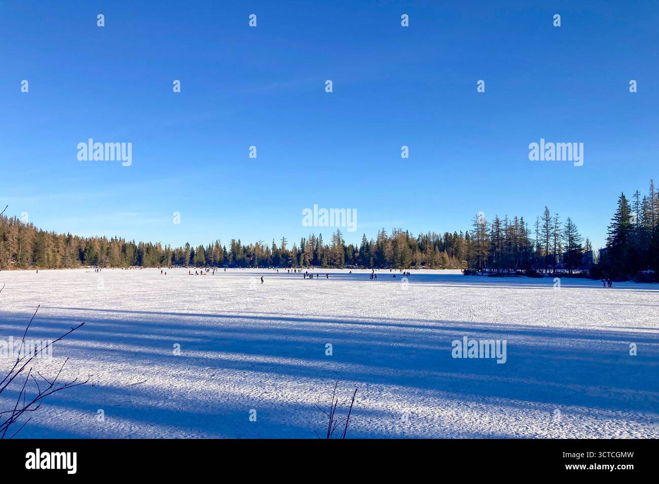 SLOVAKIA, STREBSKE PLESO - DECEMBER 30, 2024: Winter landscape of Strbske pleso which is a ski, top tourist destination, and health resort located on - Smartphone Captured Stock Image