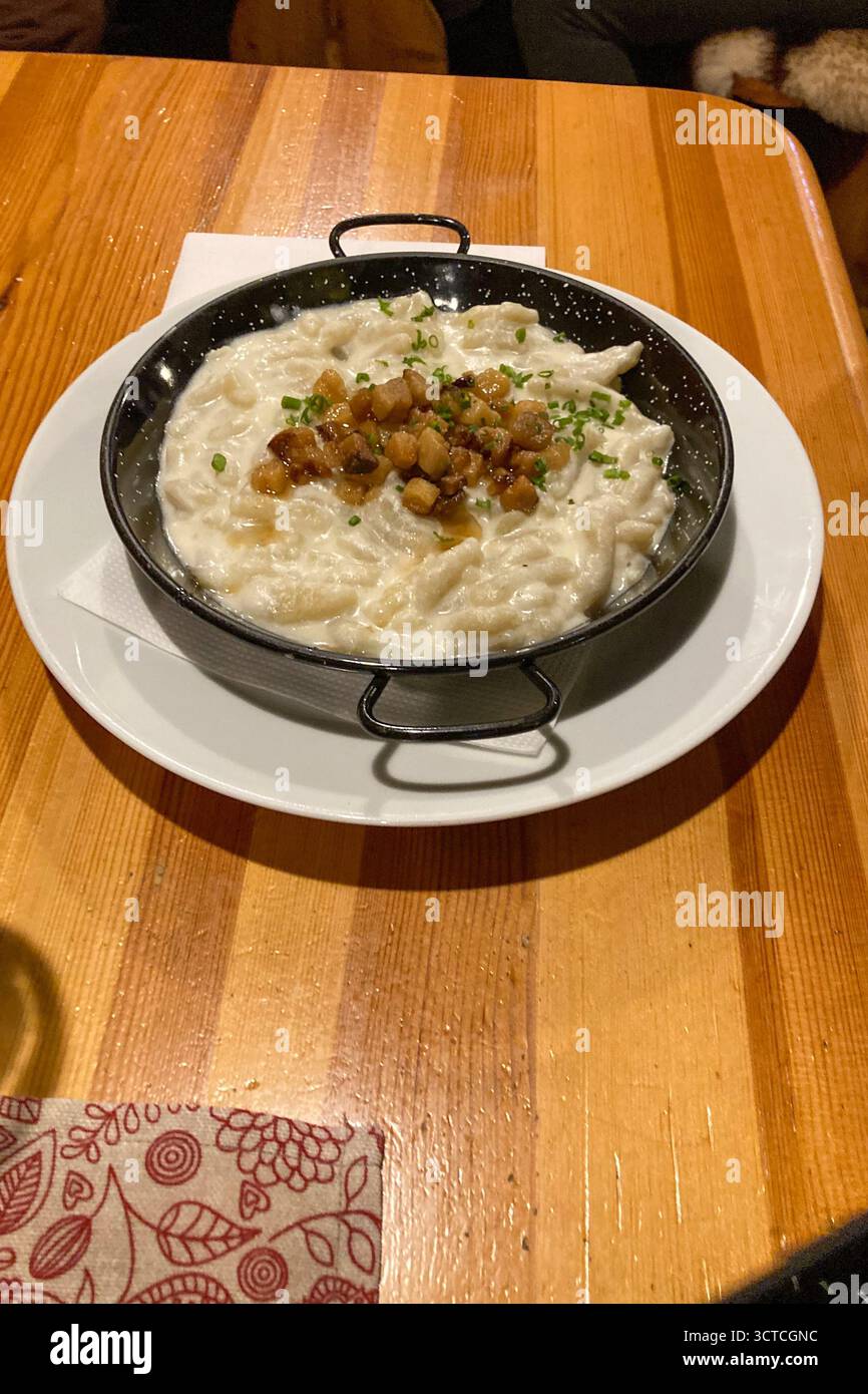 Delights of Kapustnica (sauerkraut soup), classic Slovak winter national meal features tangy sauerkraut and a mix of meats like pork and sausage, drie - Smartphone Captured Stock Image