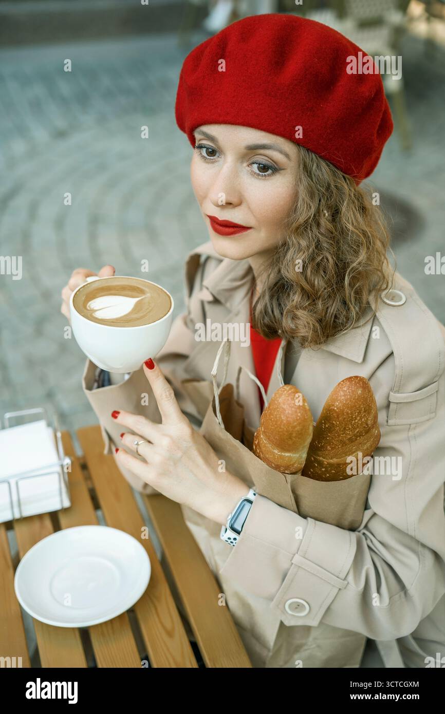 Woman in beret enjoys hi-res stock photography and images - Alamy