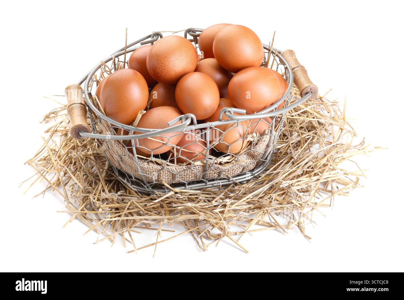 Chicken eggs in basket and nest isolated on white Stock Photo - Alamy