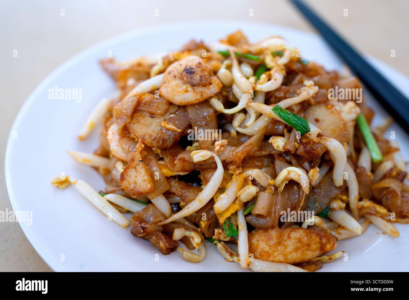 Stir fried flat noodle which is known as char keow teow in Penang ...