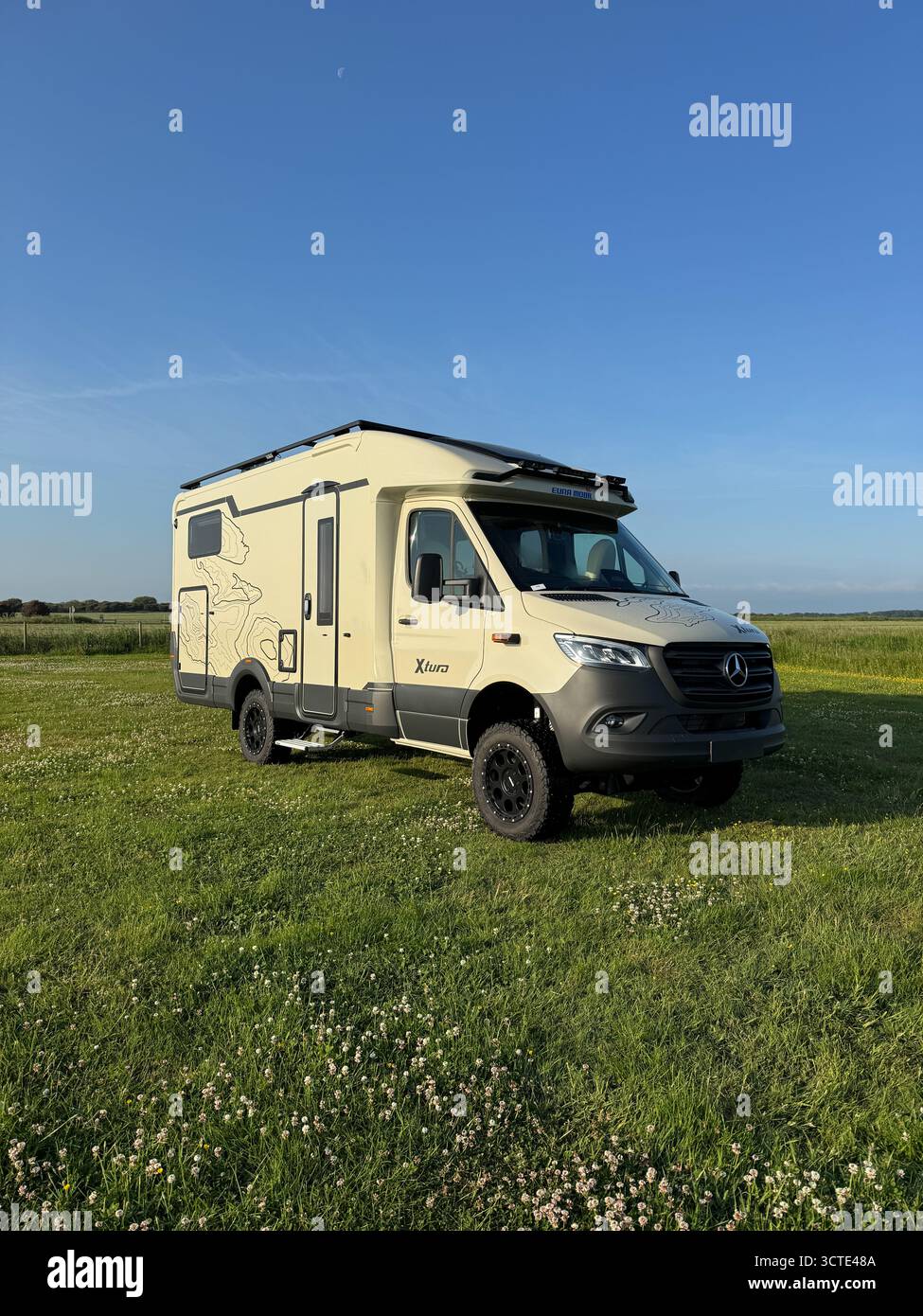 Eura Mobil Xtura 686 EF motorhome pitched at Cliff House Farm Certificated Location near Hornsea, East Yorkshire, England. - Smartphone Captured Stock Image
