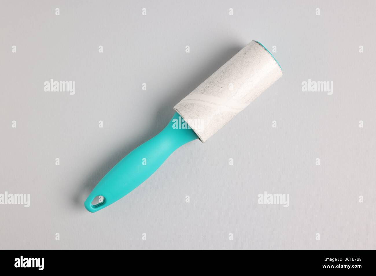 One lint roller on light grey background, top view Stock Photo