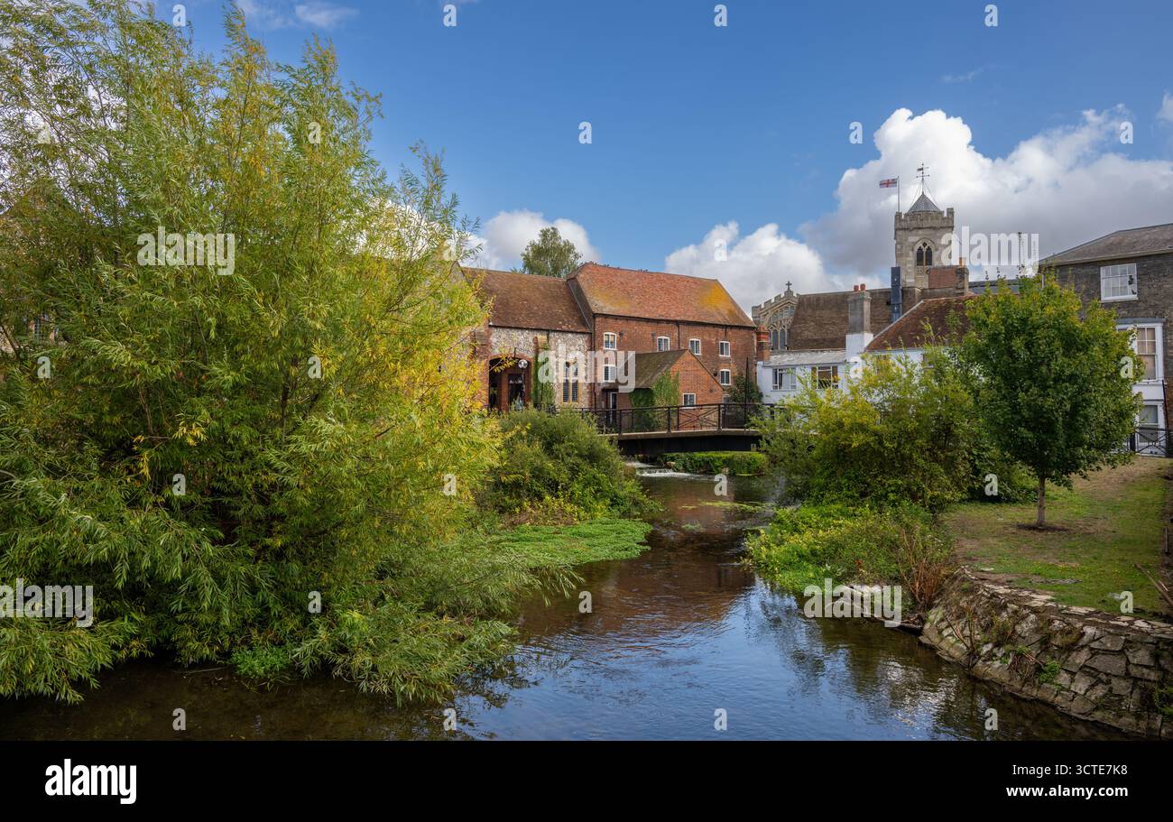 Salisbury, Wiltshire, UK:  The River Avon in central Salisbury seen from Fisherton Street with St Thomas's Church in the background. Stock Photo