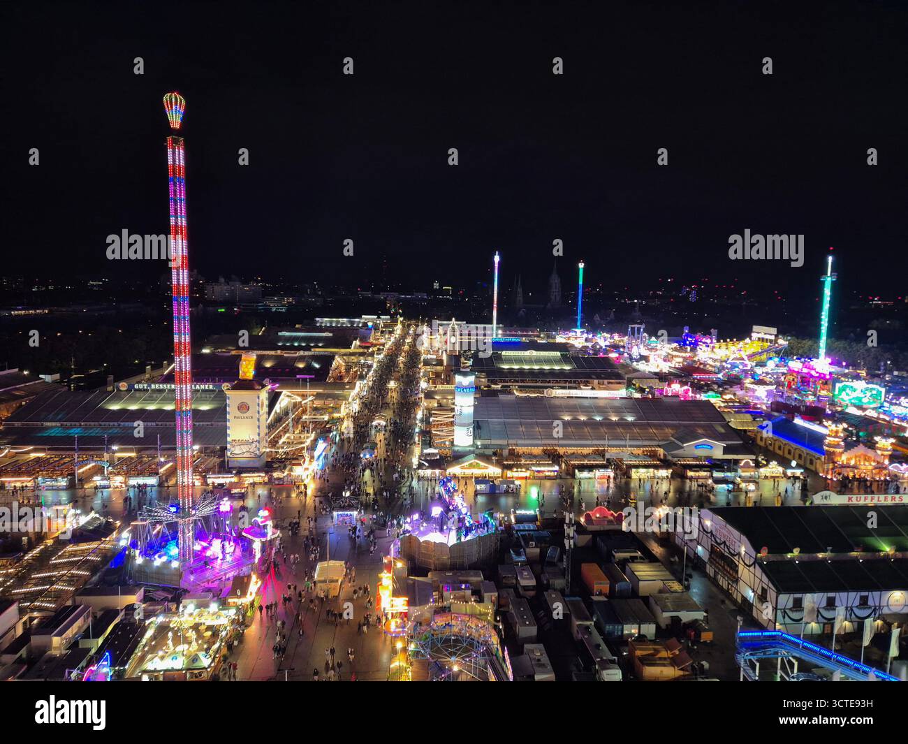 MUNICH, GERMANY - OCTOBER 5: View of the Oktoberfest in Munich, Germany at night on October 5, 2025. Stock Photo