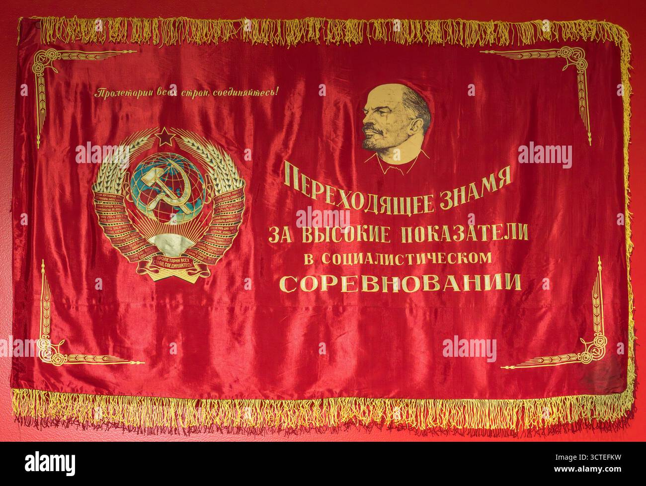 Soviet Flag, Anchorage Museum, Anchorage, Alaska, USA. The flag is a challenge banner for high performance in socialist competition and features a por Stock Photo