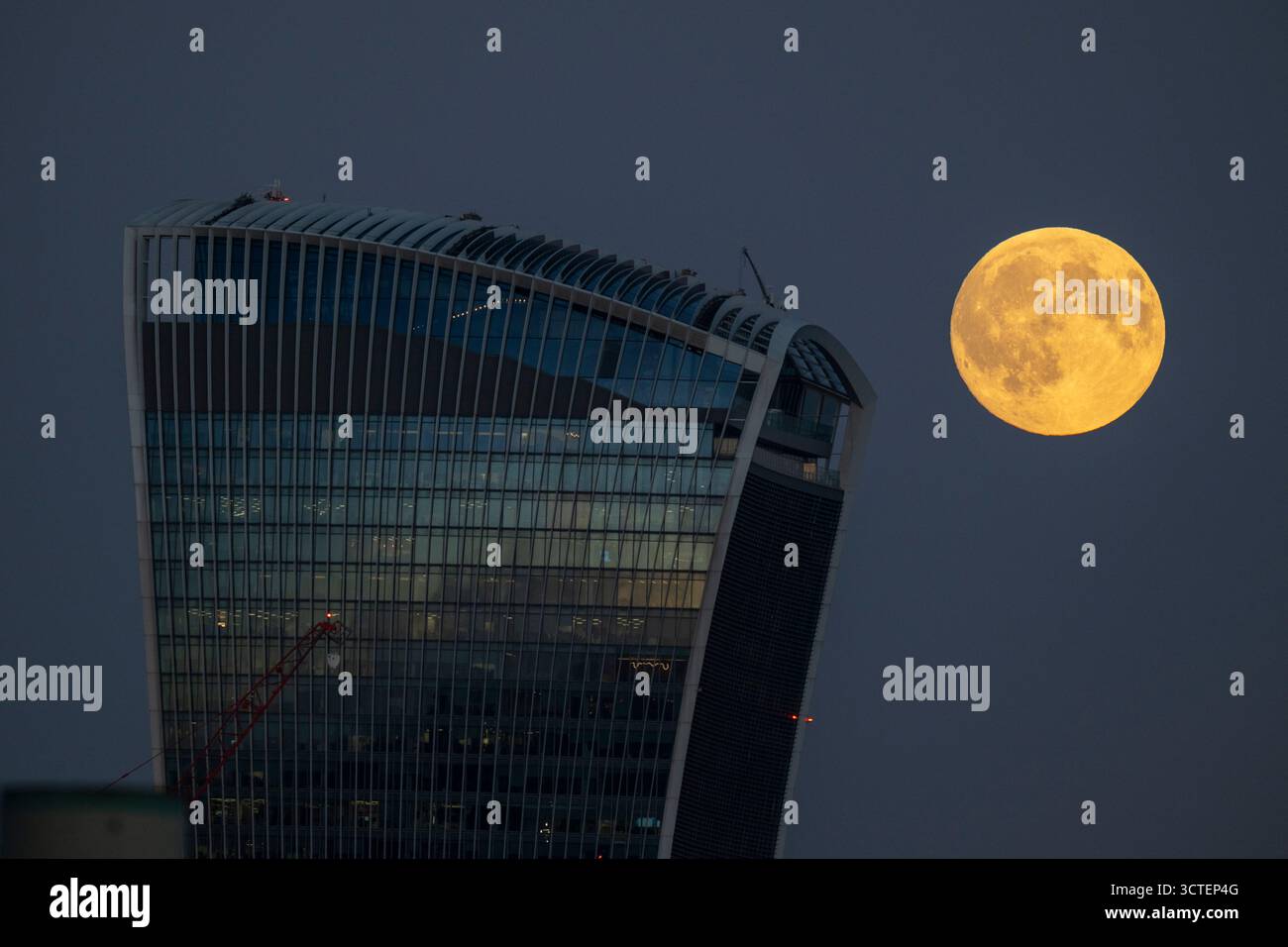 London, UK. 6 October 2025. UK Weather – The full Harvest Moon rises ...