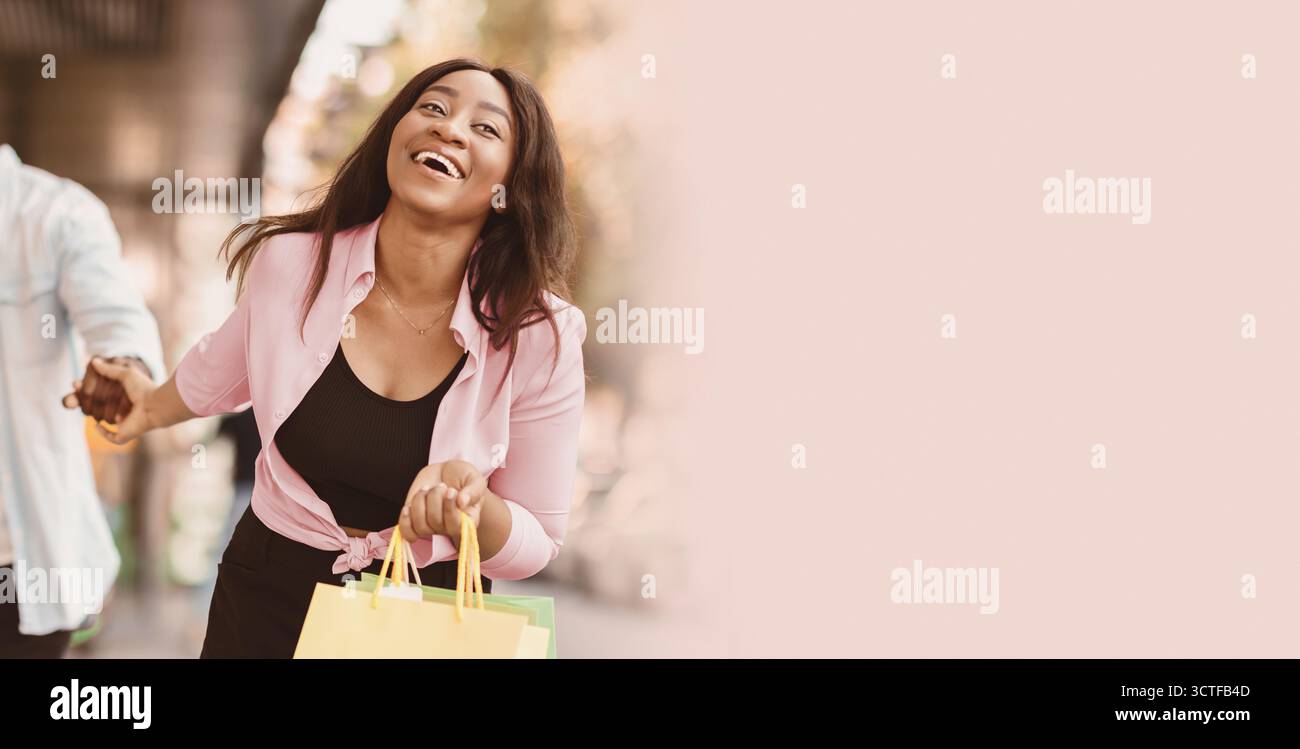 Excited black woman boyfriend hi-res stock photography and images - Alamy
