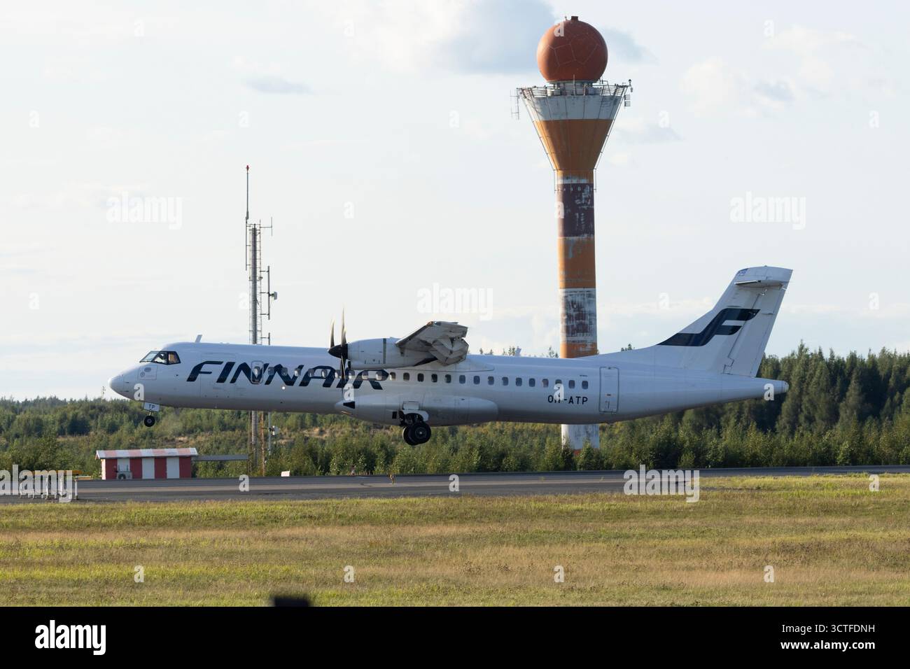 Finnair ATR 72 plane landing in Helsinki airport Stock Photo