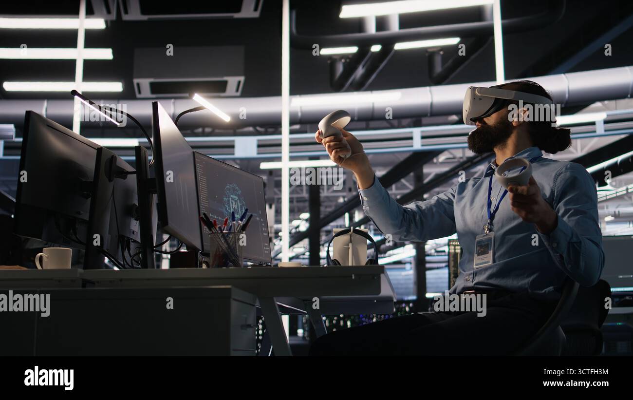 Data center developer using virtual reality technology to visualize artificial intelligence LLM neural networks. Server farm IT expert using VR headset equipment to oversee AI systems, camera A Stock Photo