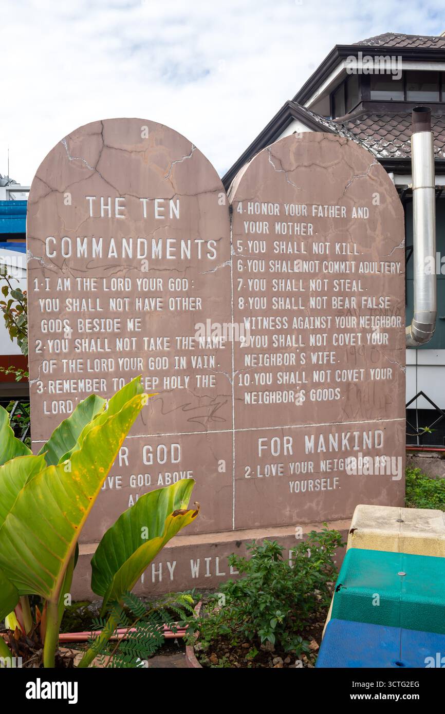monument with the text of the Ten Commandments. The monument is made of stone and is shaped like two tablets, Baguio Philippines Stock Photo