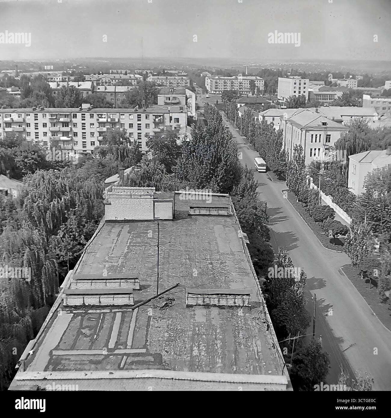 A high-angle rooftop view looking down on Svobody Street in Sloviansk ...