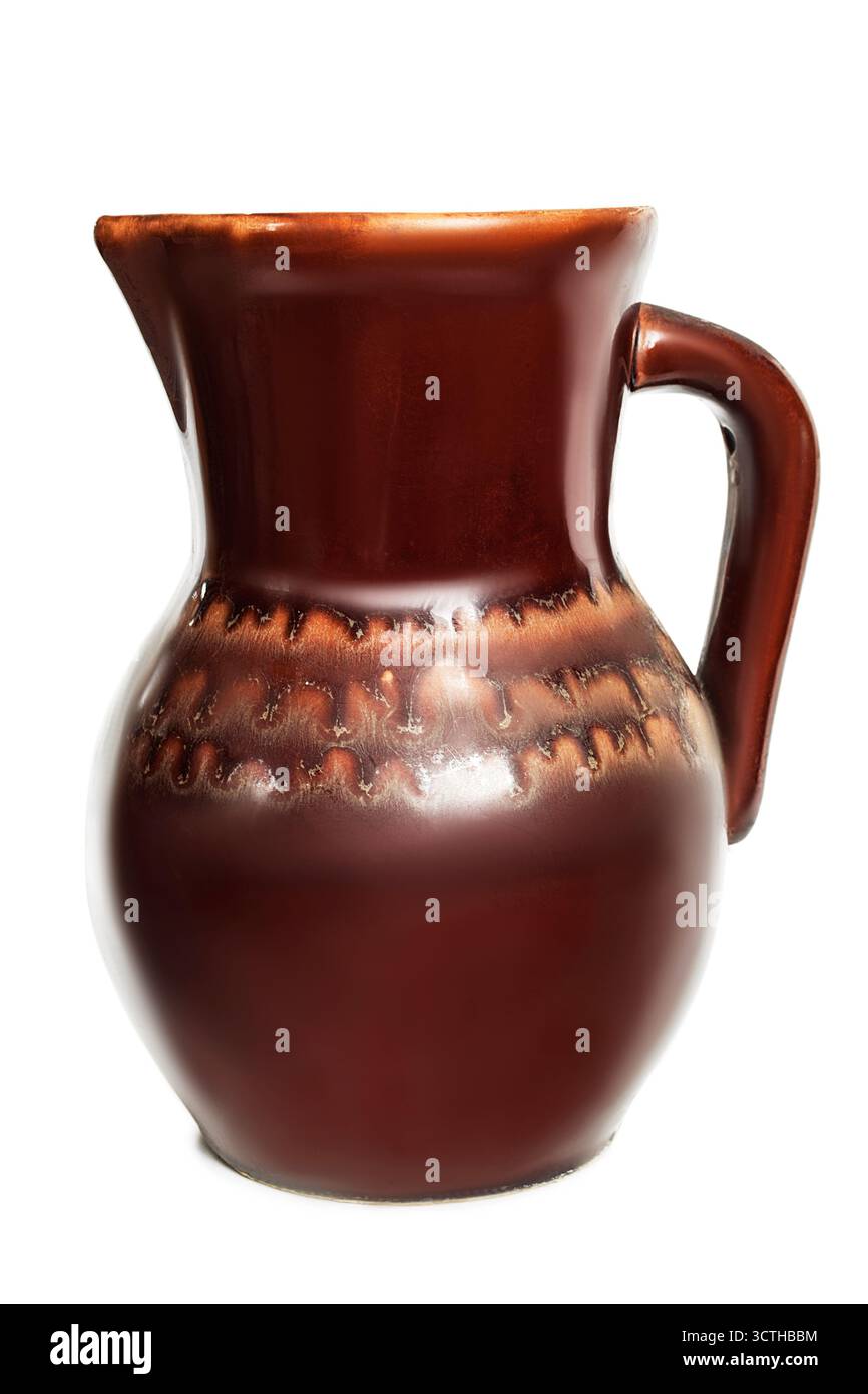 Vintage brown ceramic jug isolated on white background Stock Photo