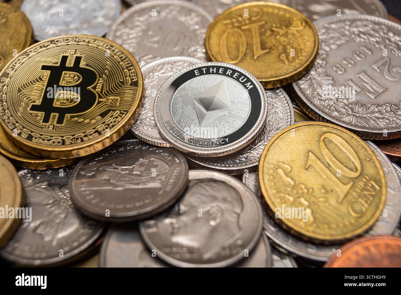 Different types of cryptocurrency are displayed among various coins and ...
