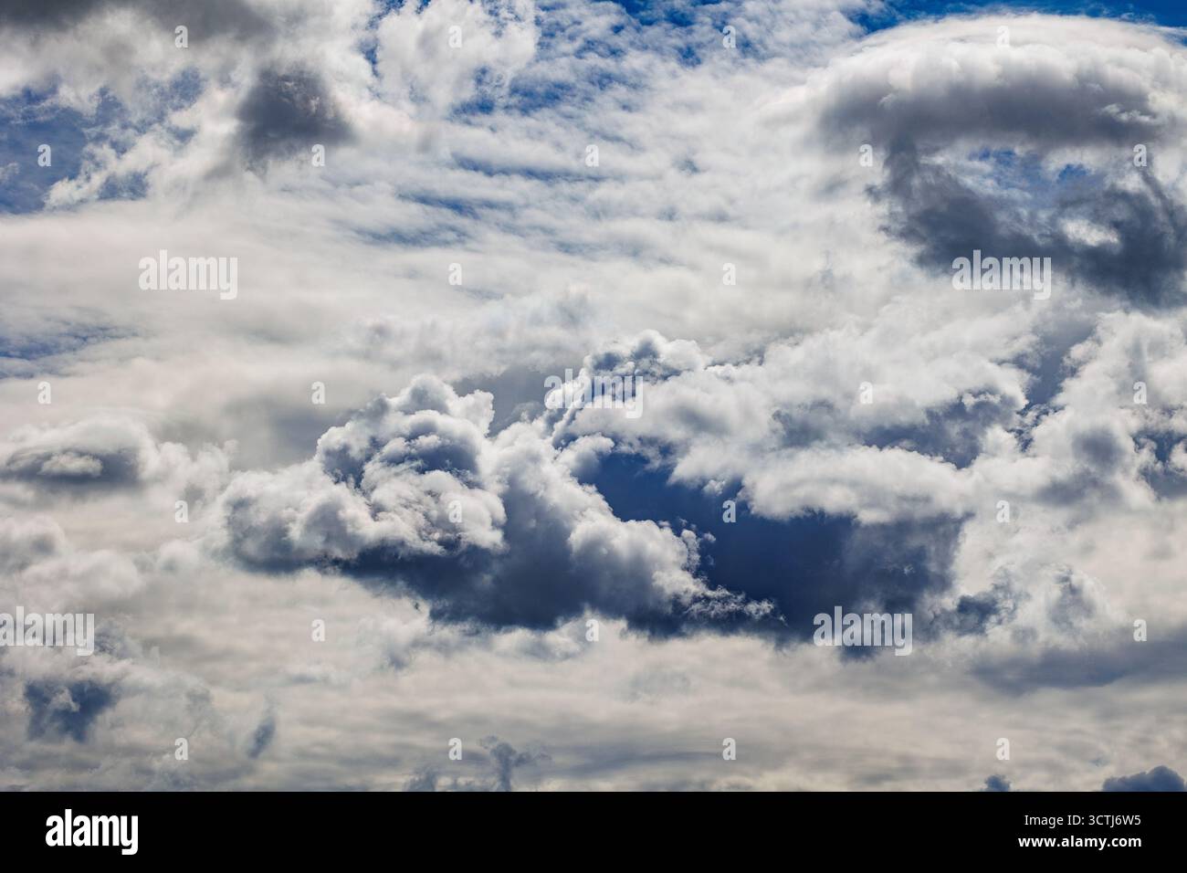 White clouds on a blue sky during summer, Poland Stock Photo