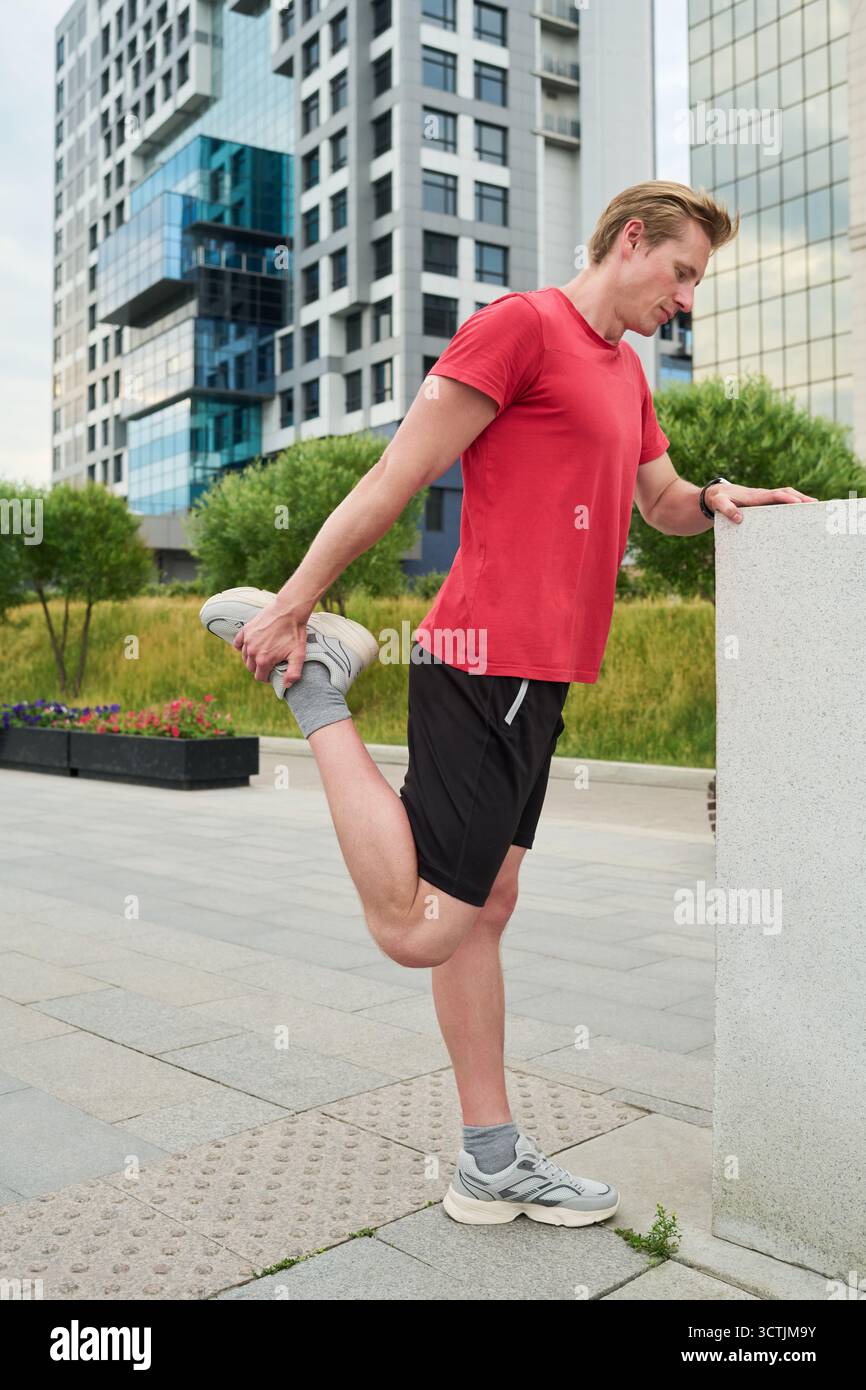 Dynamic stretching leg hi-res stock photography and images - Alamy