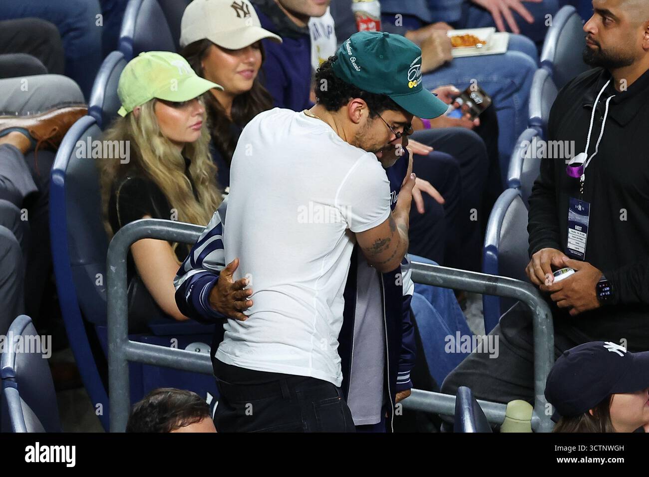 BRONX, NY - OCTOBER 07: Spike Lee hugs Bad Bunny during the ALDS Game 3 ...