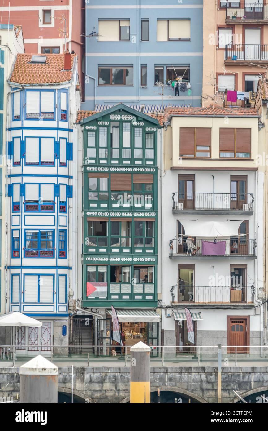 Traditional Basque Architecture with Colorful Facades, Northern Spain, Enclosed Balconies, Typical Buildings, Coastal Town, Residential Buildings Stock Photo