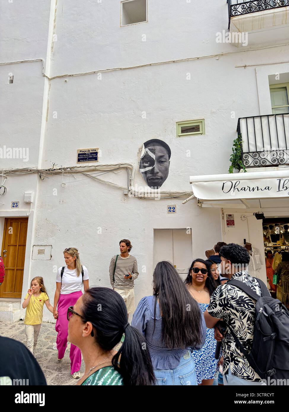 Paste-Up Street Art Portrait of Pharrell Williams on Whitewashed Wall, Dalt Vila, Ibiza, Spain: Phillip Roberts - Smartphone Captured Stock Image