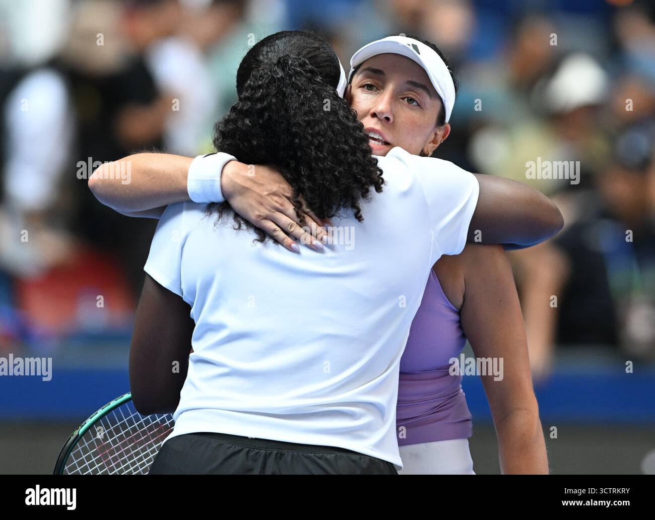 Wuhan, China's Hubei Province. 8th Oct, 2025. Jessica Pegula of the United States hugs Hailey Baptiste of the United States after their women's singles round of 32 match at the 2025 Wuhan Open tennis tournament in Wuhan, central China's Hubei Province, Oct. 8, 2025. Credit: Cheng Min/Xinhua/Alamy Live News Stock Photo