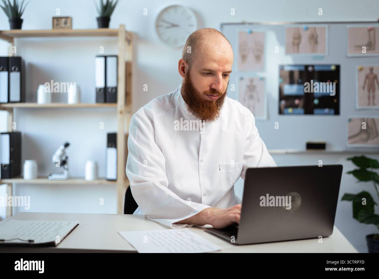 Gp practice nurse typing hi-res stock photography and images - Alamy